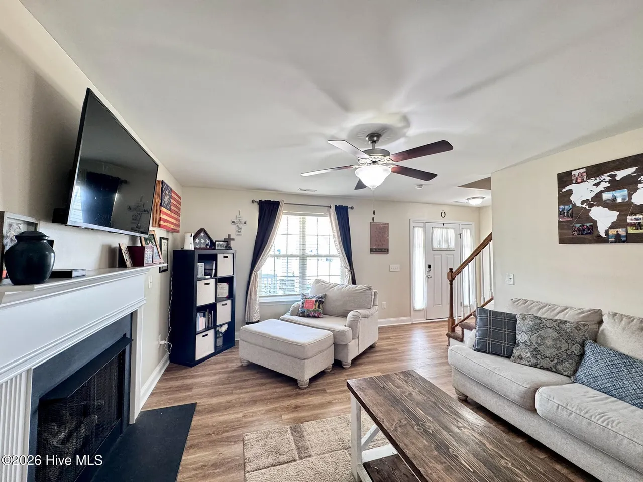 Living room with fireplace at 141 Waterford Way in Maysville