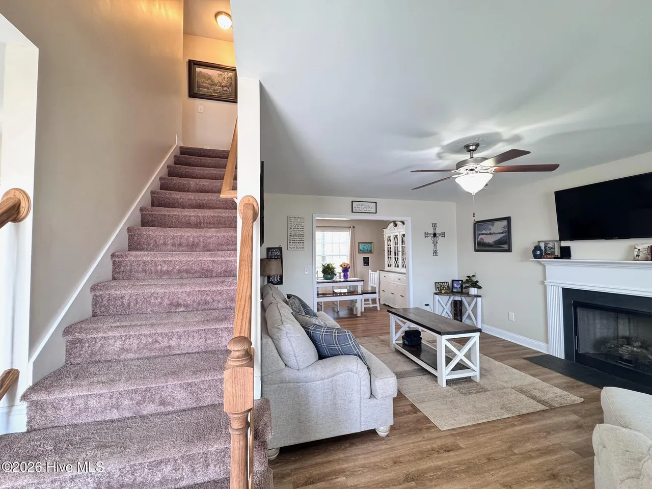 Staircase and living room at 141 Waterford Way in Maysville